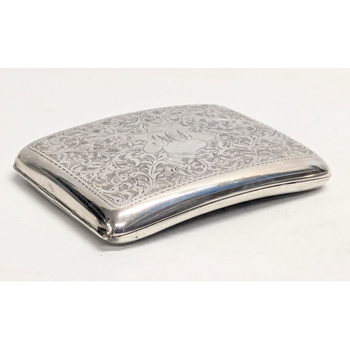 569 - An early 20th century silver cigarette case by Henry Williamson Ltd. Birmingham, 1915. 114g. 10x8.5c... 