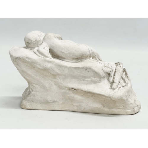 60 - A Lorna Adamson ‘Cupid Asleep’ figure. Dated 1911. 16x7x9.5cm