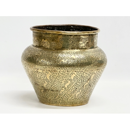 108 - A late 19th century Persian brass jardiniere. Circa 1880-1900. 24x21cm