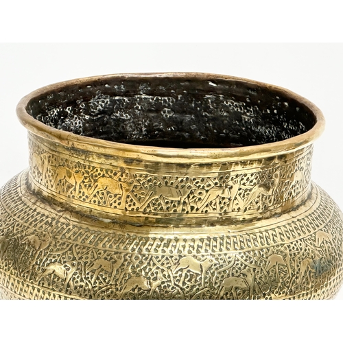 108 - A late 19th century Persian brass jardiniere. Circa 1880-1900. 24x21cm