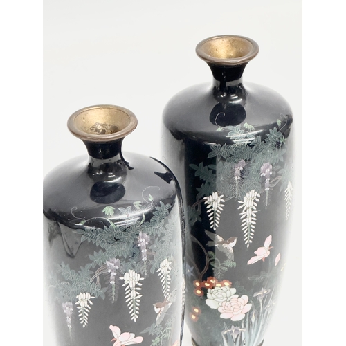 110 - A pair of good quality late 19th century Japanese Meiji period cloisonné enamelled vases with wild f... 