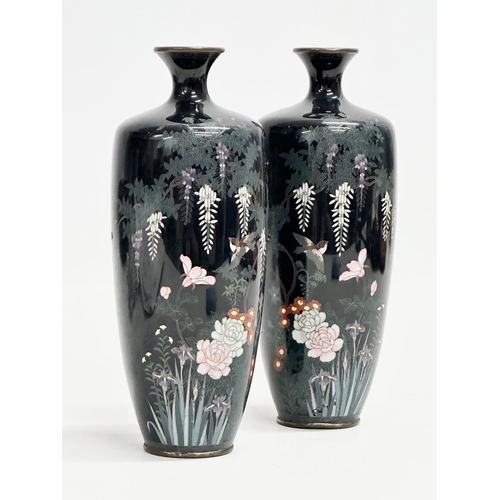 110 - A pair of good quality late 19th century Japanese Meiji period cloisonné enamelled vases with wild f... 