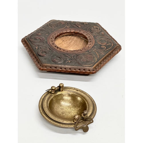 248 - A late 19th century embossed leather bound ashtray with original brass liner. Depicting Don Quixote ... 