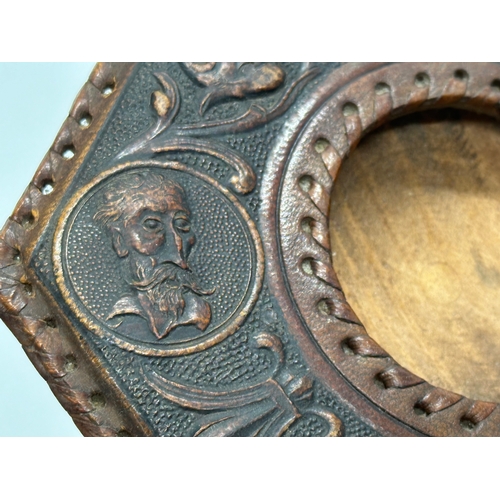 248 - A late 19th century embossed leather bound ashtray with original brass liner. Depicting Don Quixote ... 