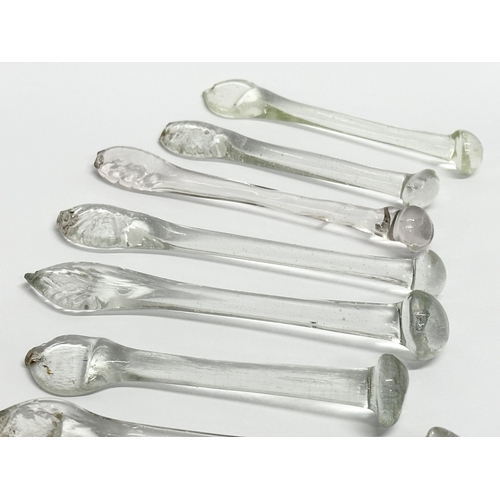 250 - A collection of 8 George III handmade glass sugar crushers. Circa 1800-1820. 13cm