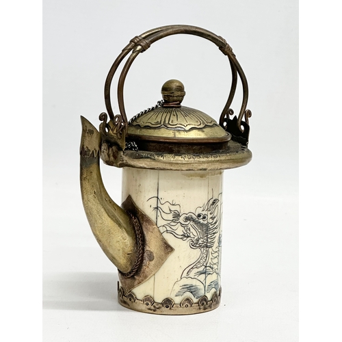 20 - A rare late 19th/early 20th century Chinese bone opium pot with brass mounts, original liner and pou... 