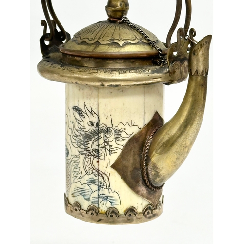 20 - A rare late 19th/early 20th century Chinese bone opium pot with brass mounts, original liner and pou... 