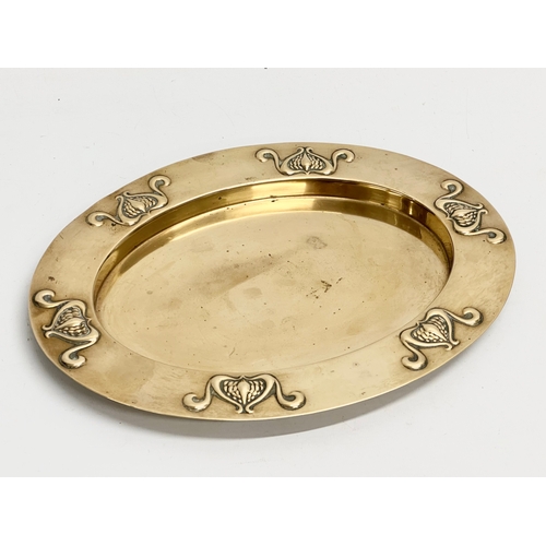 287 - An early 20th century Art Nouveau brass tray. Circa 1900. 31x24cm