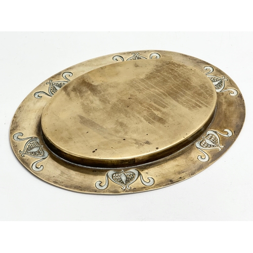 287 - An early 20th century Art Nouveau brass tray. Circa 1900. 31x24cm