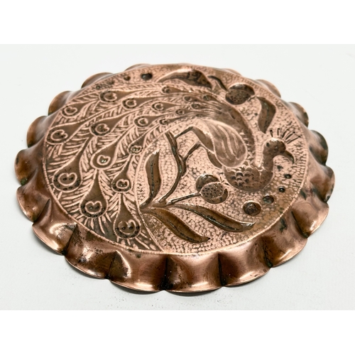 48 - A late 19th century Irish Arts & Crafts copper ‘Peacock’ card tray. By John Williams. Circa 1890-190... 