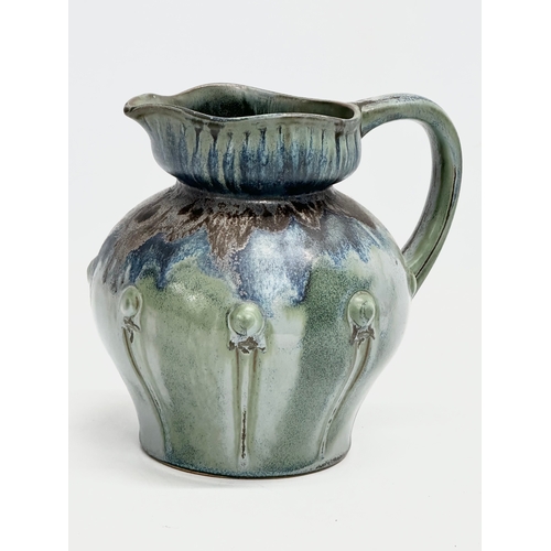 498 - A 1930’s French glazed stoneware jug by Denbac. 17x14x16cm