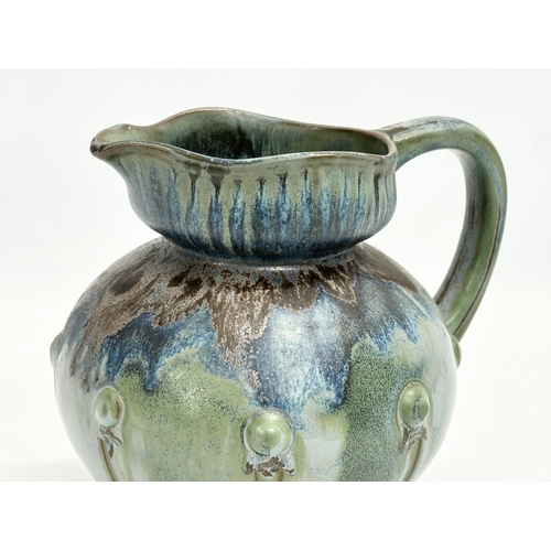 498 - A 1930’s French glazed stoneware jug by Denbac. 17x14x16cm