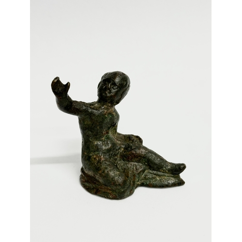 40 - Ancient bronzes. An Egyptian 12th Dynasty Osiris statuette. A Roman bronze child sitting statuette. ... 