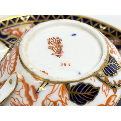 293 - A pair of late 19th century Royal Crown Derby Imari tea cups and saucers. Circa 1880-1900.