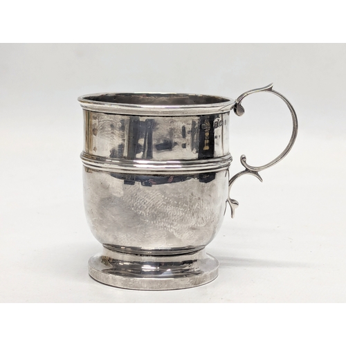 582 - An early 20th century silver Christening cup in case by Levi & Salaman. Birmingham, 1926. 41.3g. 7.5... 