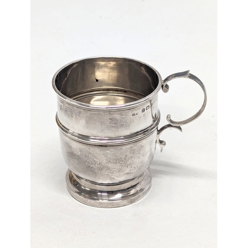 582 - An early 20th century silver Christening cup in case by Levi & Salaman. Birmingham, 1926. 41.3g. 7.5... 