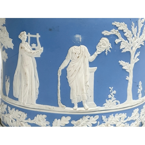 295 - Large late 19th century Jasperware. A large Jasperware cheese dome and a jardiniere by Wedgwood. 26x... 