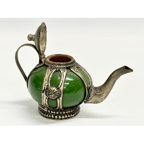 297 - A rare early 20th century Chinese/Tibetan enamelled stoneware teapot. Circa 1900. 15x9.5cm