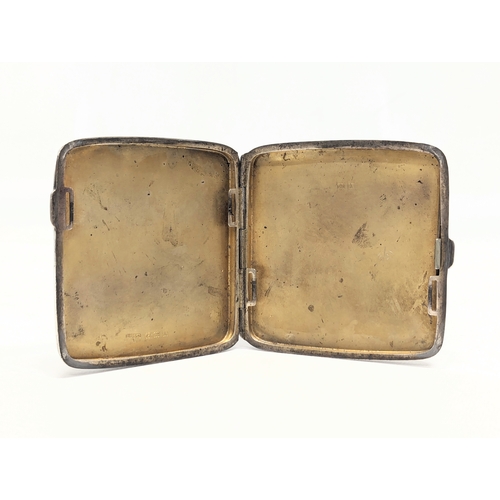 585 - An early 20th century silver cigarette case by F. H. Adams & Co. Birmingham, 1925. 97.8g