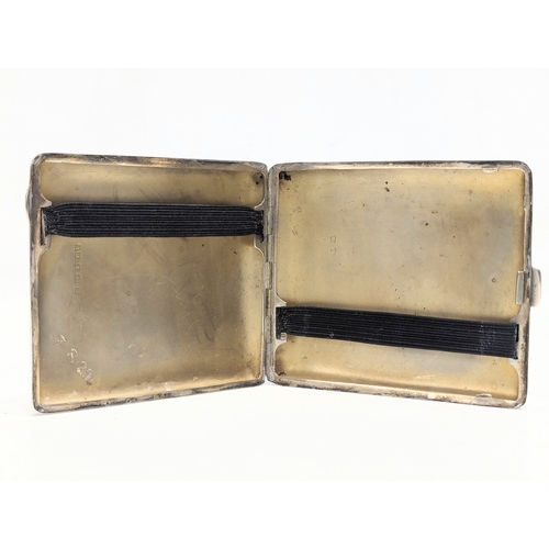 611 - An early 20th century silver cigarette case by Henry Matthews. Birmingham, 1926. 115.7g