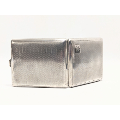 611 - An early 20th century silver cigarette case by Henry Matthews. Birmingham, 1926. 115.7g