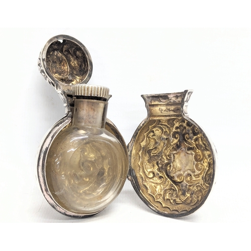 613 - A 19th century silver perfume bottle case with original glass bottle. Birmingham, 1875. Case weighs ... 