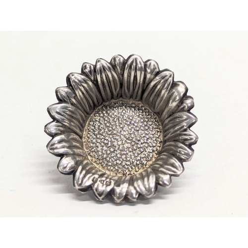 616 - 2 pieces of silver including a napkin ring by Henry Griffith & Sons. Birmingham, 1953. 33.7g