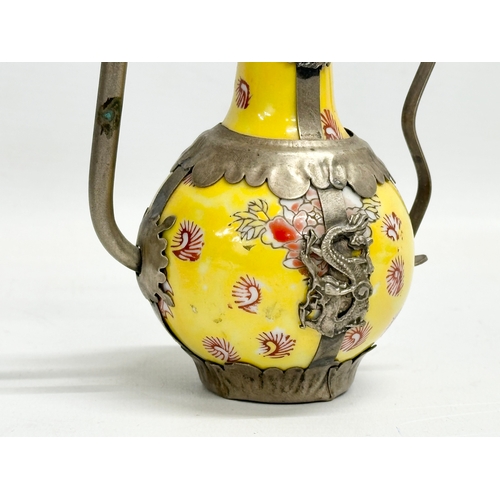 298 - A collection of two 20th century Chinese/Tibetan enamelled metal bound teapots. 16th/17th century se... 