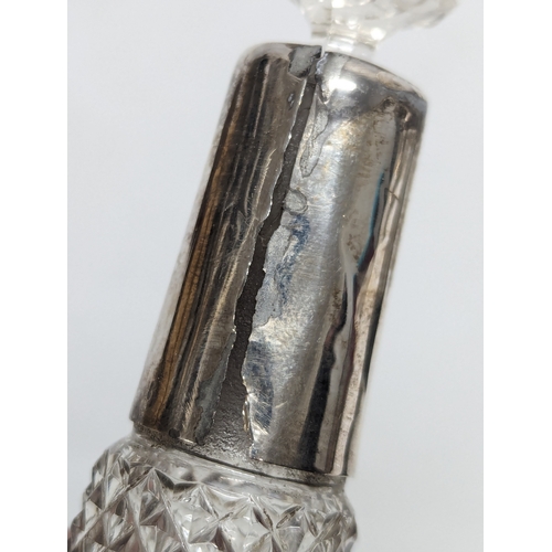 621 - A 3 piece late 19th / early 20th century silver mounted perfume set. Pair measures 14.5cm