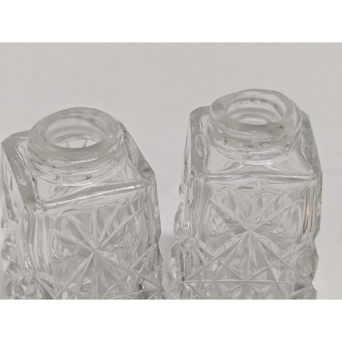 622 - A pair of early 20th century cut glass vanity jars with silver lids by Burtons & Waters. Birmingham,... 