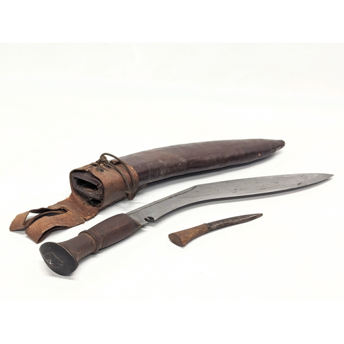 499 - A vintage Gurkha style Kukri knife.