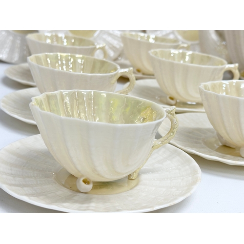 51 - A 23 piece 4th period Belleek pottery ‘Neptune’ seashell tea service. Early/mid 20th century.