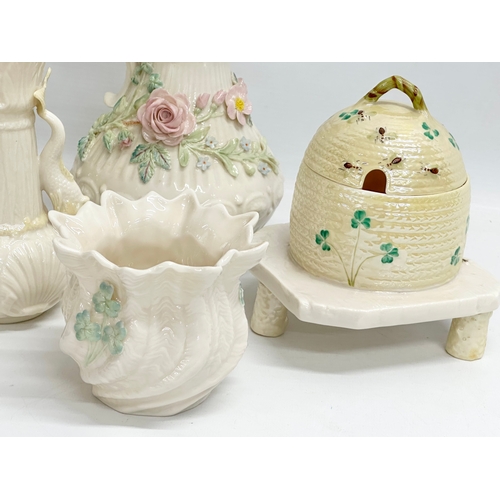 301 - A collection of 4th period Belleek pottery. Honey pot 15x16cm. Jug 23cm.