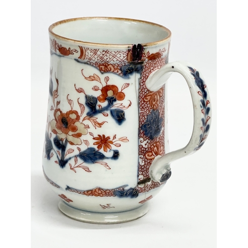 50 - An 18th century Chinese early Qianlong (1735-1799) tankard mug. Circa 1840. 14x9.5x14cm