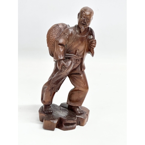 302 - 2 early 20th century Chinese Fisherman figures. 16x29cm