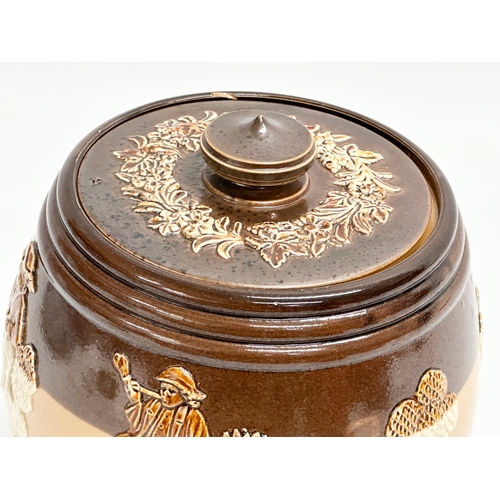 304 - A large early 20th century Royal Doulton Lambeth ‘Harvest’ tobacco jar. 13.5x17cm