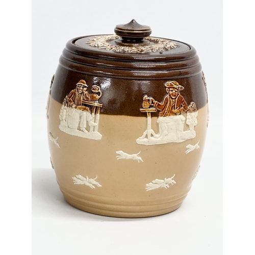 304 - A large early 20th century Royal Doulton Lambeth ‘Harvest’ tobacco jar. 13.5x17cm