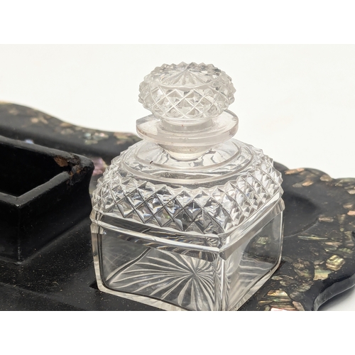 672 - A Victorian lacquered desktop organiser with Mother of Pearl inlay. 32.5x26cm