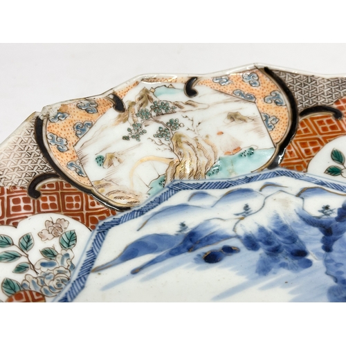 65 - A late 19th century Japanese Meiji period (1868-1912) Imari Fan Shaped bowl. Decorated with birds in... 