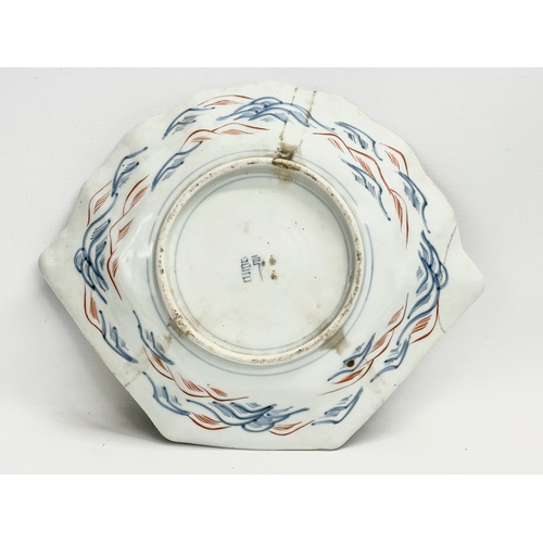 65 - A late 19th century Japanese Meiji period (1868-1912) Imari Fan Shaped bowl. Decorated with birds in... 