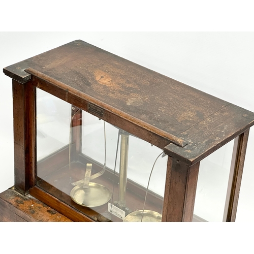 323 - Andrew H. Baird. An early 20th century balance scales case by Andrew H. Baird with Becker’s Sons sca... 