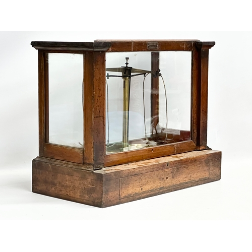 323 - Andrew H. Baird. An early 20th century balance scales case by Andrew H. Baird with Becker’s Sons sca... 