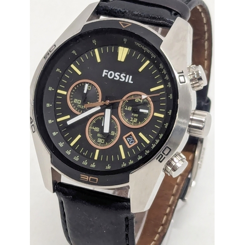 643D - A gents Fossil watch with leather strap