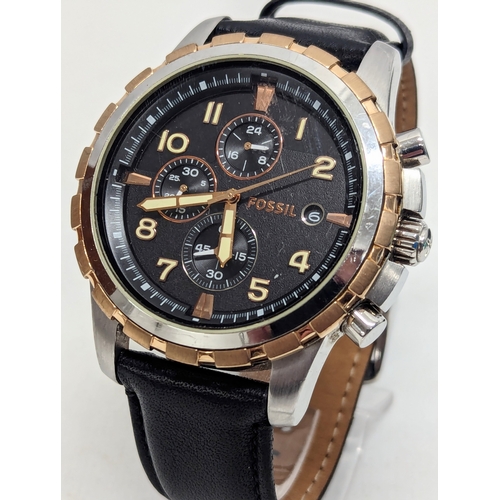 643E - A gents Fossil watch with leather strap