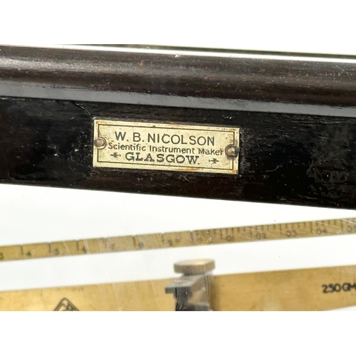 325 - A vintage Griffin & George Limited balance scales in a W.B. Nicolson case. 46x25x41.5cm