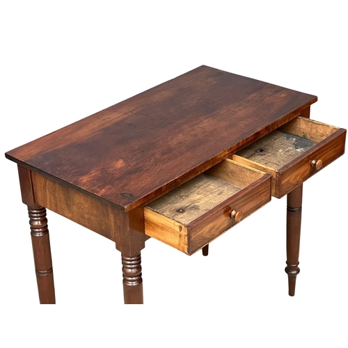 926 - A George IV mahogany side table with 2 drawers. Circa 1820. 89x48x77cm