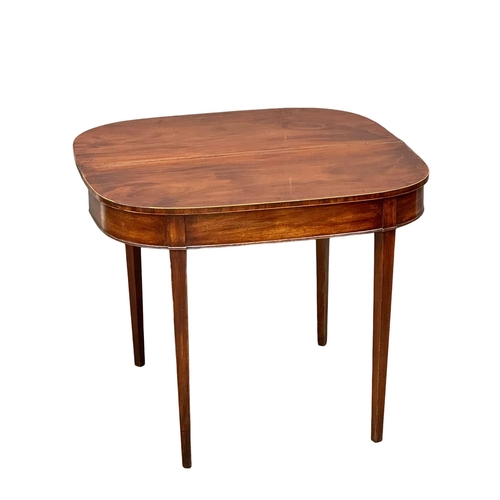 930 - A George III inlaid mahogany turnover tea table. Circa 1800. 91x45.5x73cm