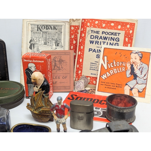 675 - A quantity of vintage collectables. Including a quantity of vintage tins, Parker Super Quick permane... 