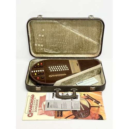 497 - A Suzuki Omnichord with case. 011968.