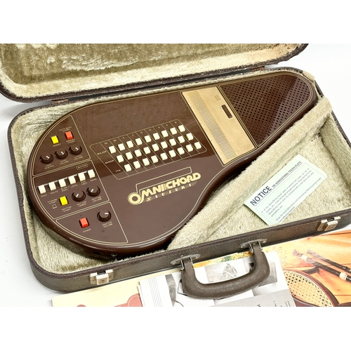 497 - A Suzuki Omnichord with case. 011968.